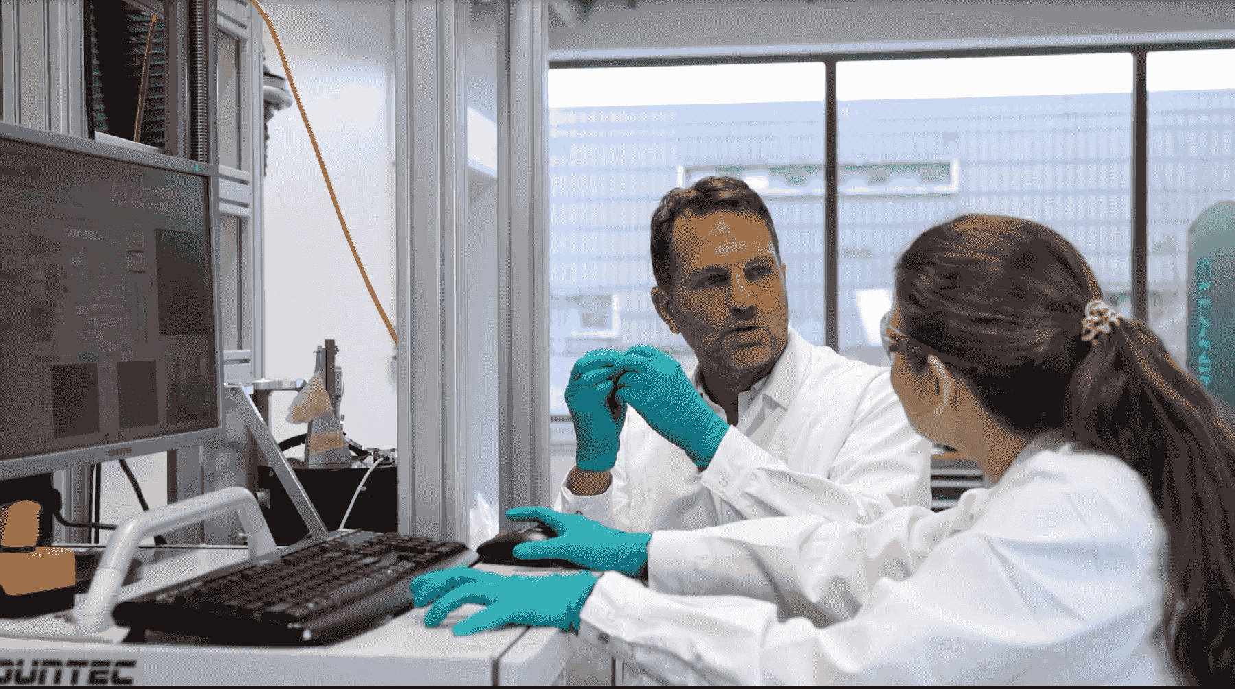 Glice engineers reviewing test data in the lab