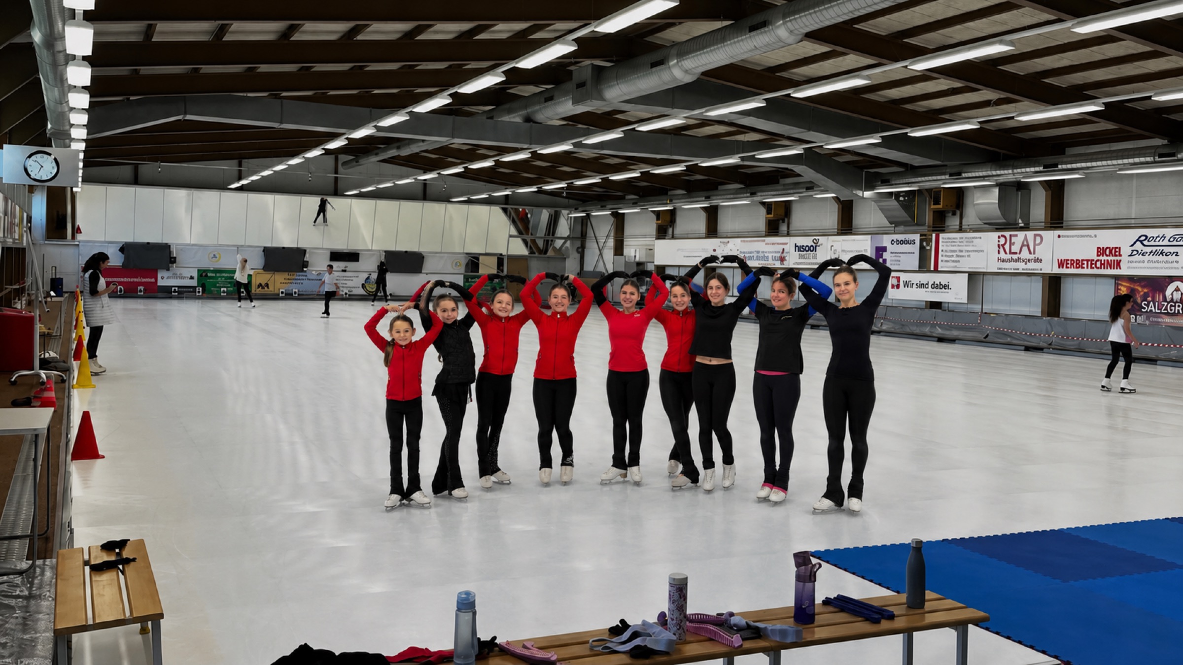 Skaters of Figure Skating Club Wallisellen on the Glice surface installed over their rink for the summer