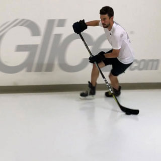 NHL Star Roman Josi Practicing On Synthetic Ice Rink
