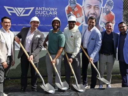 MEN Holding Shovels