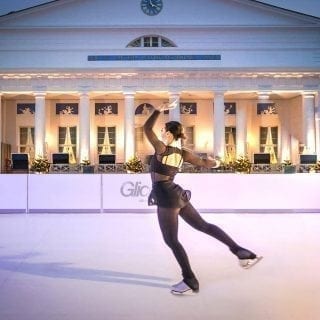 Professional Figure Skater Sarah Meier Performing On Artificial Ice Rink