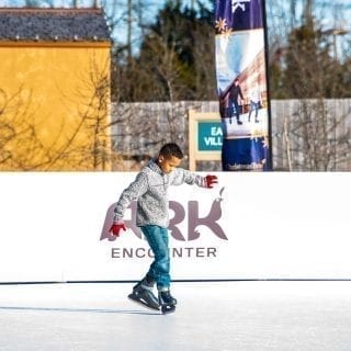 Kid On Synthetic Ice Rink At Ark Encounter In The US