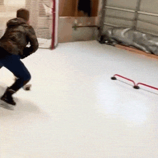 Boy playing ice hockey on Glice