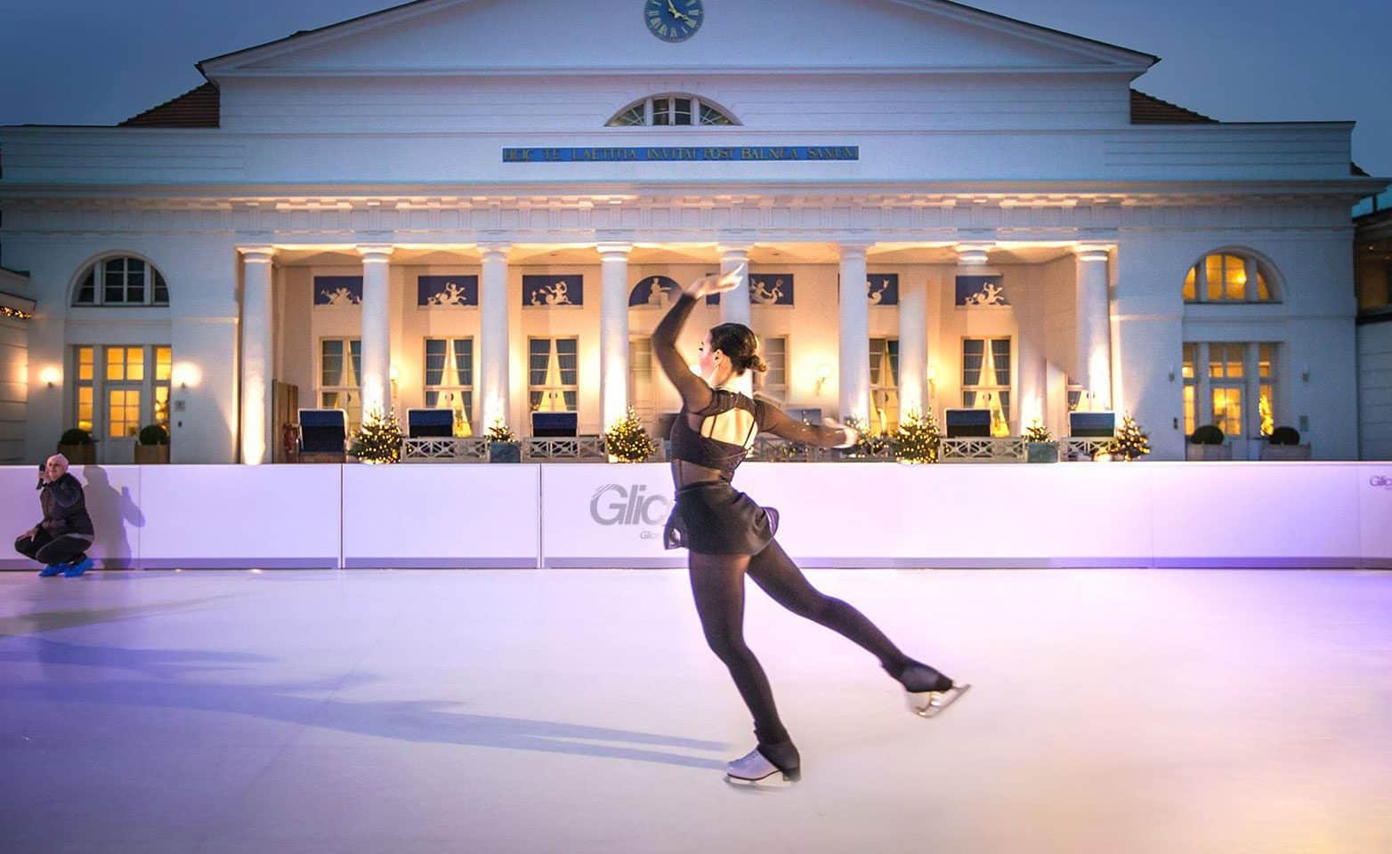 Professional figure skater Sarah Meier performing on artificial ice rink