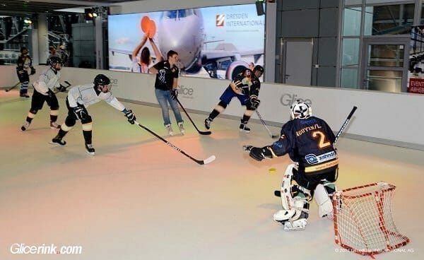 Hockey players practicing on a Glice synthetic ice rink - best synthetic ice