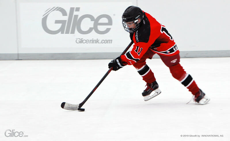 Boy playing ice hockey