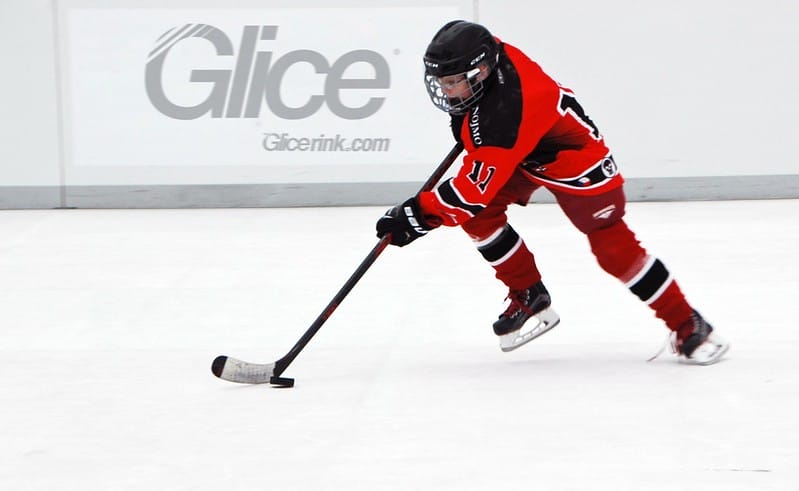 Hockey player on synthetic ice
