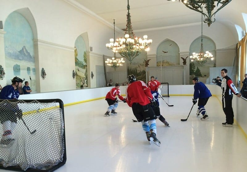 Hockey players skating on iceless ice