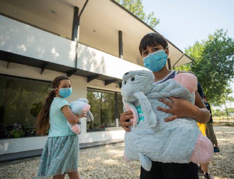 two kids with teddy bears