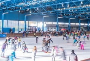 Massive municipal synthetic ice rink conversion