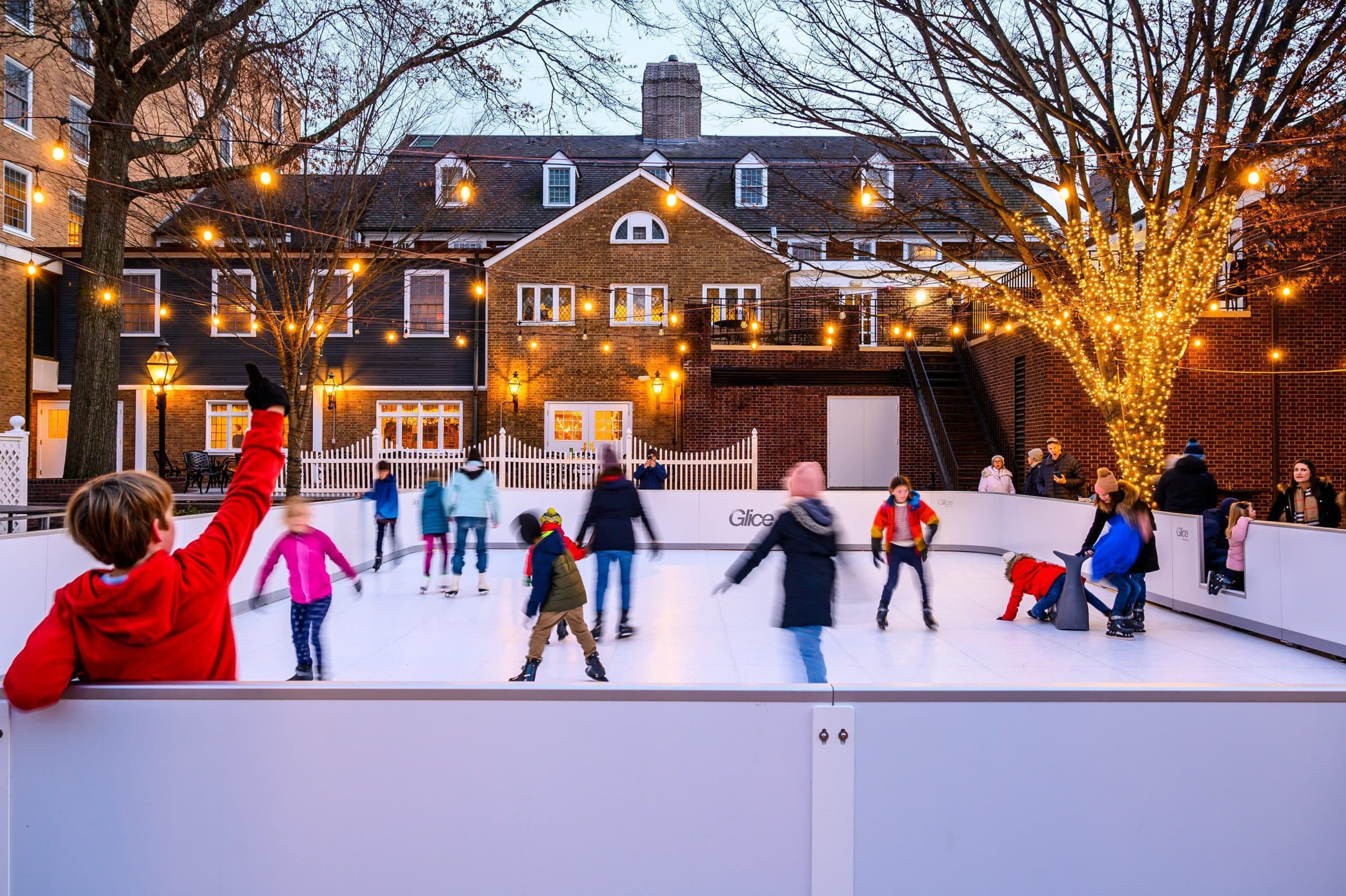 People skating on outdoor ice-rink